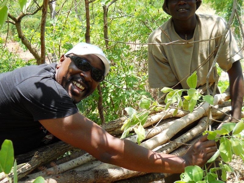 Kevin and Cecil with sticks for the concrete slab